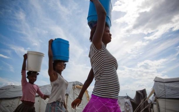 woman-carrying-water-haiti-ogb-62211_610x381.jpg